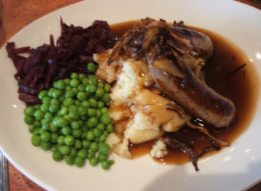 So what is bangers & mash? Simply put, it's sausage stuck into mashed 